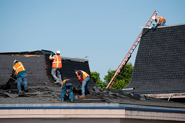 Roofing team working on roof